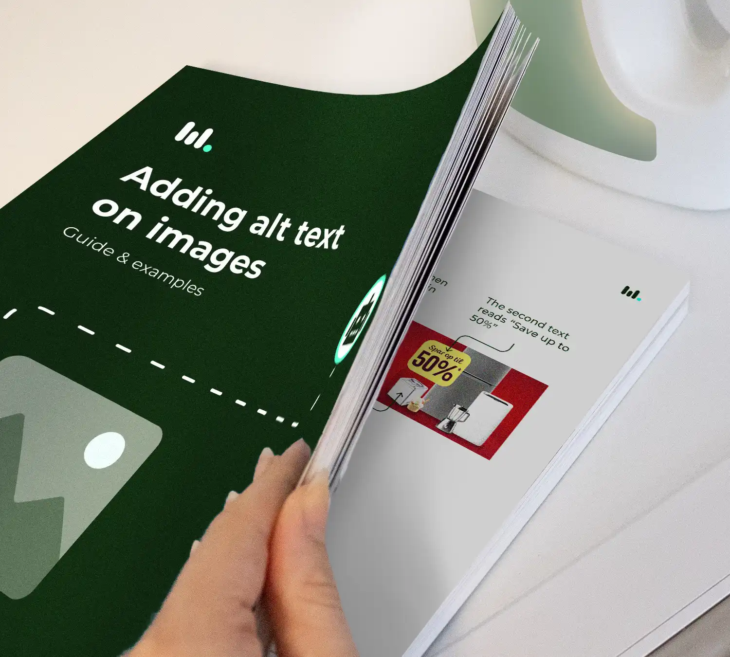 Peak inside a book on "Adding alt text on images" opened besides a detergent.
