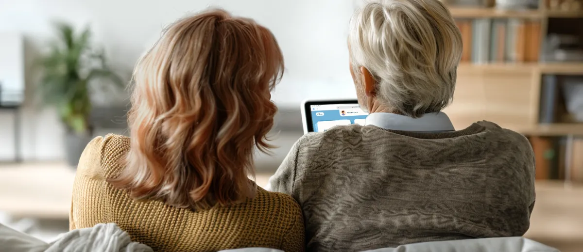 Husband and wife using app in their living room